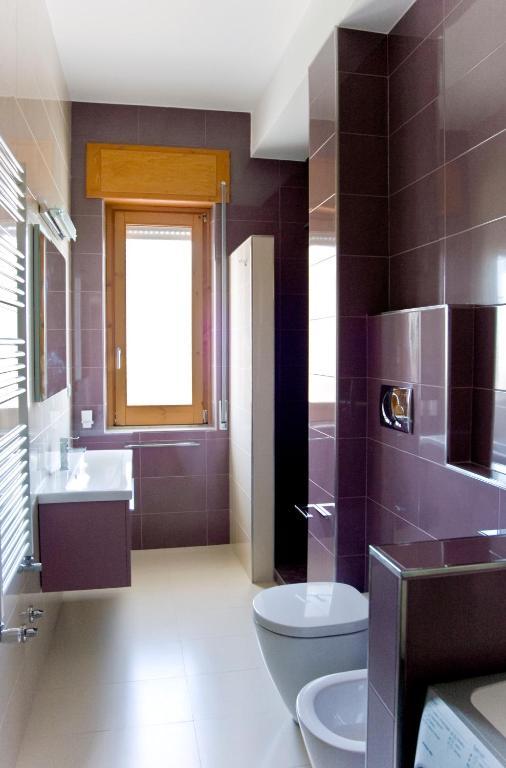 أسشيا Instile Aparthotel الغرفة الصورة